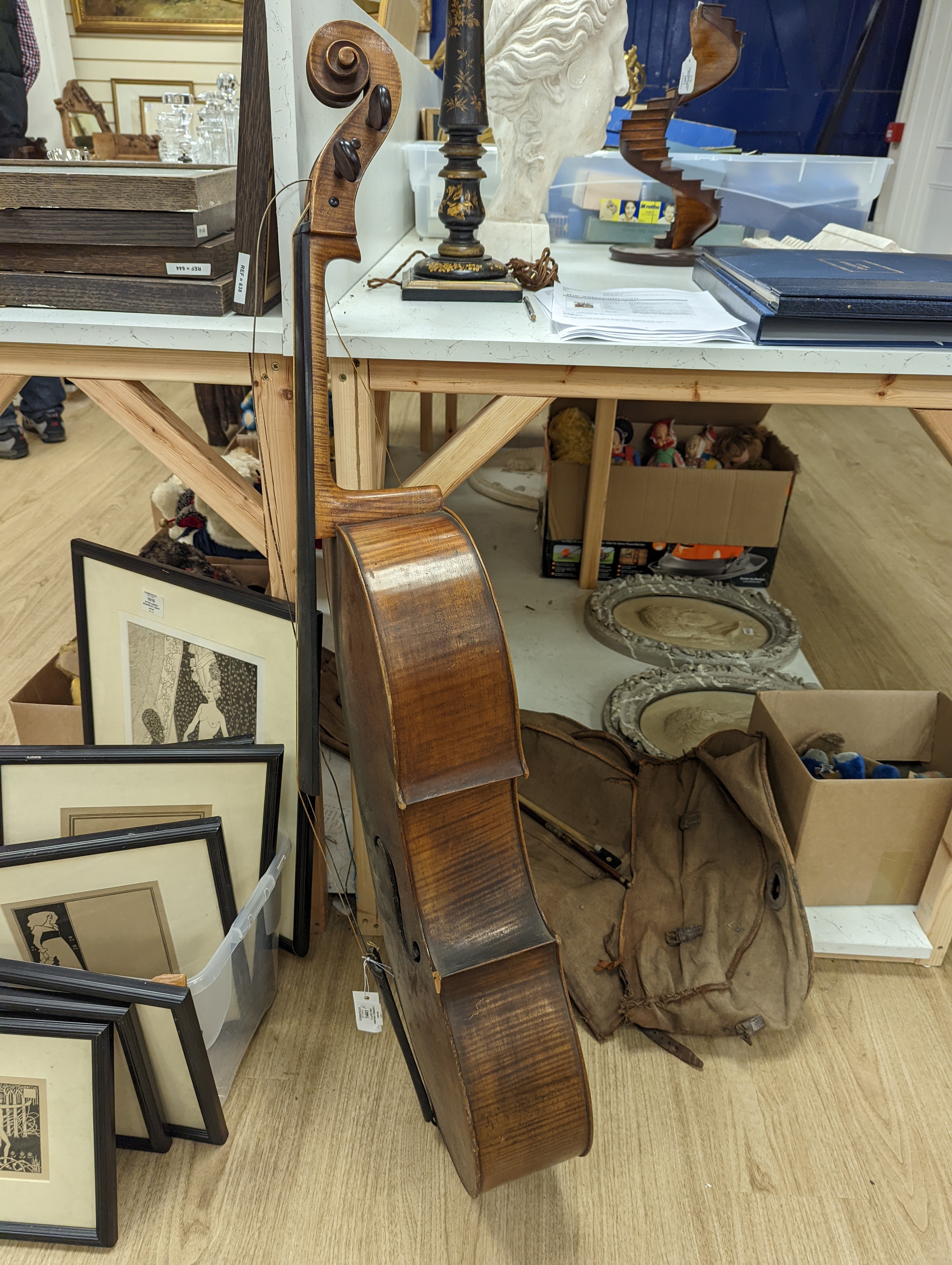 A late 19th century French cello, lob 75.5cm, canvas case with bow